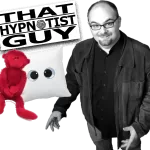 Audience applauding during a clean comedy hypnosis performance